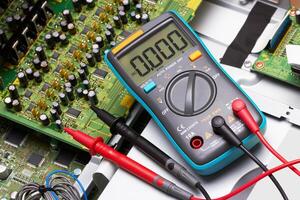 Repair electronic circuit board closeup photo