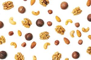 Pattern of nuts mix isolated on white photo