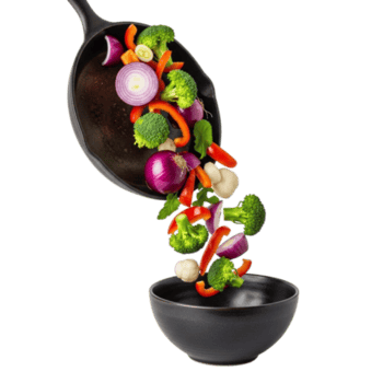 fresco assortito verdure cadendo a partire dal un' wok in un' ciotola la creazione di un' dinamico culinario scena isolato su trasparente sfondo png