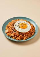 Spicy Kimchi Fried Rice with Egg and Sesame Seeds Isolated photo