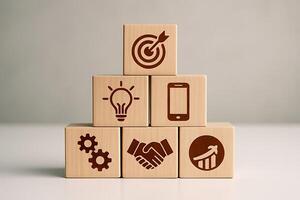 Wooden blocks with business icons stacked strategy photo