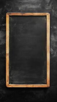 A plain black chalkboard with a wooden frame, perfect for educational settings or artistic expression, awaits new ideas and messages photo
