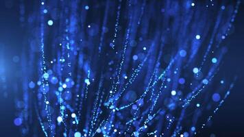 azul brilhando partículas fluxo dentro vertical córregos em uma Sombrio fundo, criando uma hipnotizante digital chuva efeito. perfeito para tecnologia, futurista, ou abstrato visuais. desatado ciclo video