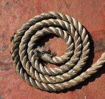 Rope on grunge metal photo