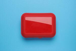 Plastic box on a blue photo