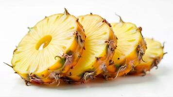 Ripe pineapple slices with visible seeds and juicy yellow flesh are isolated on a white background. Suitable for food blogs, healthy eating promotions, and tropical fruit advertisements. photo