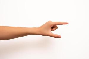 A human hand is isolated against a white background, making a pinching gesture with the thumb and index finger. Suitable for illustrating concepts of measurement, size, or digital interaction in isolated contexts. photo
