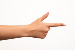 Human hand with extended index finger pointing right, isolated on a white background. Suitable for concepts of direction, instruction, or navigation in presentations and educational materials. photo