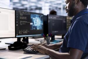 System administrator reconfiguring artificial intelligence server farm to optimize it for data processing requirements of customers. AI expert working to ensure data center gear operates efficiently photo