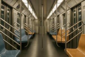 Empty Subway Interior With Blue and Yellow Seats in Soft Lighting - Minimalist Urban Transportation Scene photo