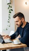 Focused Man Using Tablet with Coffee, Modern Cafe Setting, Natural Light. photo