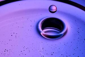 The texture of a serum or cosmetic oil with drops. photo