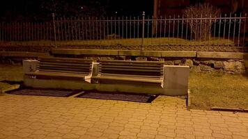 A fence around a park bench video