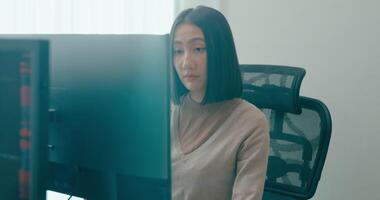 Young Asia female freelance write prompt AI bot IT app smart program nomad, game, terminal with coding language, user interface, designer, big data center on desktop computer. video