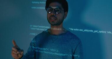 Asia male software developers leader manager talk strategy plan to executive write prompt AI bot IT app program nomad, game, designer, data center. Projecting slideshow code. video