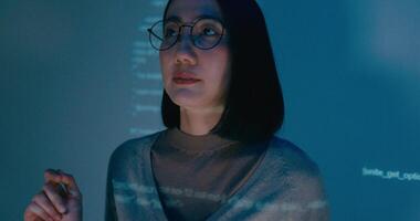 Group Asia female software developer mentor leader manager talk strategy plan to executive write prompt AI bot IT app program nomad, game, designer, data center. Projecting slideshow code. video