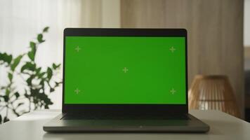 Laptop with Green Screen in Dolly Zoom Shot video