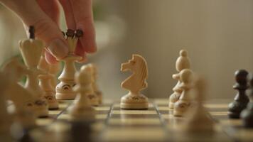 Hand Moving Queen on Wooden Chessboard video