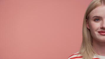 Minimal Close-Up of Smiling Woman on Pink Background video
