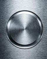 Polished stainless steel plate with smooth, reflective surface sits against brushed metal background, showcasing its sleek design and modern aesthetic. interplay of light creates captivating photo