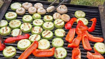 Grilled veggies sizzle under summer solstice sun, embracing Vegan BBQ Day with smoky zucchini medallions and peppery delights photo