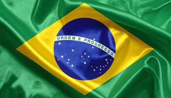 Close up of the waving flag of Brazil with its motto Ordem e Progresso. Realistic silk fabric texture. A symbol of Brazilian patriotism, culture, and national pride. photo