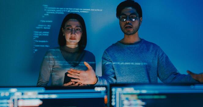 Group adult Asia male female software developers mentor leader manager talk strategy plan to executive write prompt AI bot IT app program nomad, game, data center. Projecting slideshow code. photo