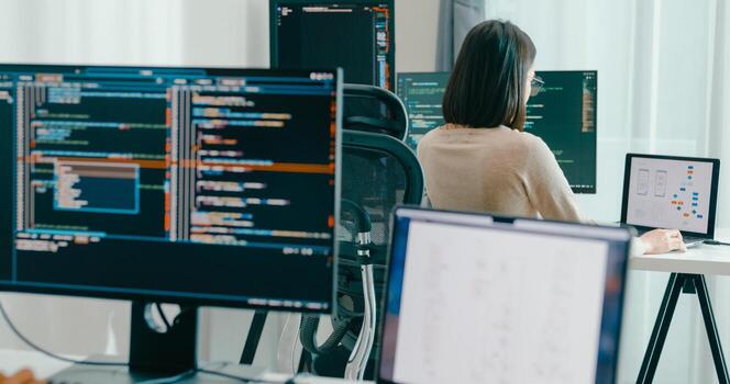 Adult Asia male, female freelance typing write prompt AI bot IT app smart program nomad, game, terminal with coding language, user interface, designer, big data center on desktop computer. photo