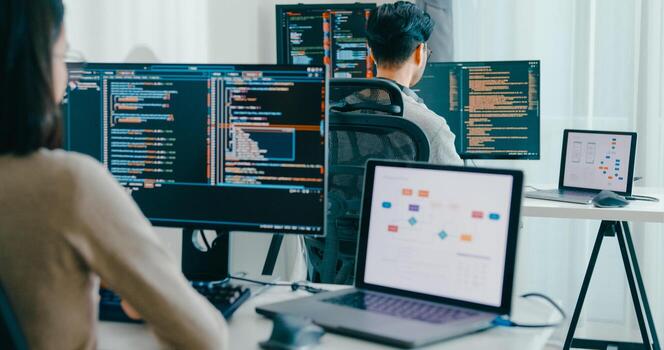 Closeup Asia male, female freelance typing write prompt AI bot IT app smart program nomad, game, terminal with coding language user interface, big data center desktop computer photo