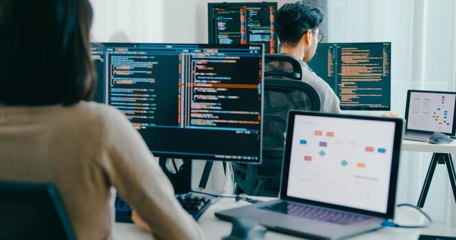 Closeup Asia male, female freelance typing write prompt AI bot IT app smart program nomad, game, terminal with coding language, user interface big data center desktop computer photo