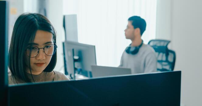 Group Adult Asia male, female freelance typing write prompt AI bot IT app smart program nomad, game, terminal with coding language, user interface, designer, data center on desktop computer photo