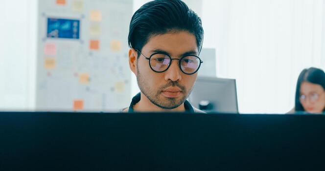 Group Adult male, female freelance typing write prompt AI bot IT app smart program nomad, game, terminal with coding language, user interface, designer, big data center on desktop computer. photo