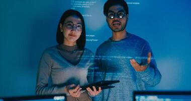 Group Asia male female software developers mentor leader manager talk strategy plan to executive write prompt AI bot IT app program nomad, game, data center. Projecting slideshow code photo