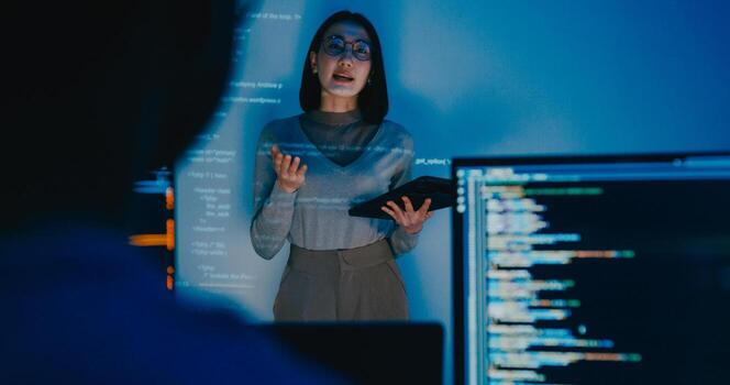 Group Asia female software developer mentor leader manager talk strategy plan to executive write prompt AI bot IT app program nomad, game, designer, data center. Projecting slideshow code photo