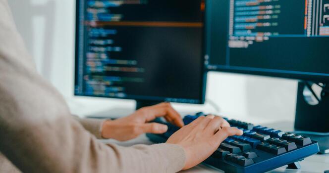 Closeup young adult Asia female freelance type write prompt AI bot IT app smart program nomad, game, terminal with coding language, user interface, designer, big data center on desktop computer. photo