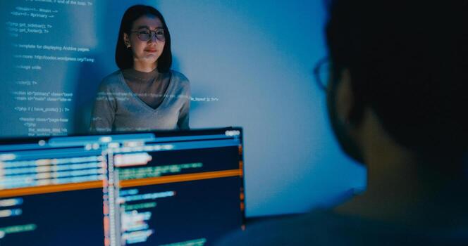 Group adult Asia female software developer mentor leader manager talk strategy plan to executive write prompt AI bot IT app program nomad, game, designer, data center. Projecting slideshow code. photo