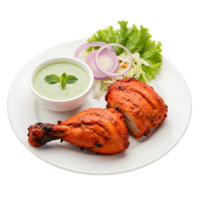 Delicious Tandoori Chicken Dish with Mint Chutney and Salad A Culinary Delight png