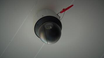 A surveillance camera on the ceiling provides advanced monitoring for security and safety video