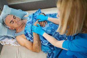 Caregiver comforts patient in calm home environment photo