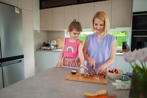 Cooking together brings joy in a sunny kitchen photo