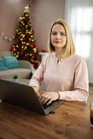 Celebrating creativity and productivity during the festive season in a cozy home office photo