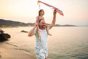 Joyful memories at the beach with family during sunset moments photo