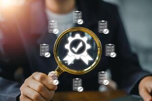 Visual representation of quality management with a magnifying glass and checkmark icons, symbolizing business excellence. photo
