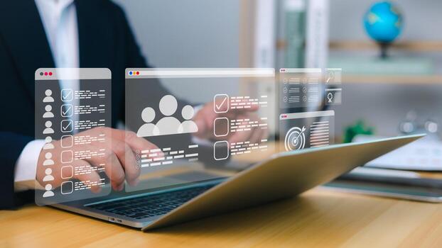Recruiting and HR management enhanced via digital workflow on laptop with holographic checklists, user profiles, and target icons for CRM and task automation. photo