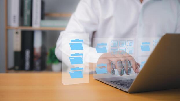 Digital file document management on laptop by professional using cloud computing, secure storage, and efficient data organization for modern business solutions. photo