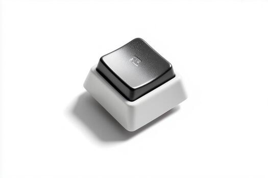 Detached computer keycap on a white background showcasing a minimalist design and functionality photo
