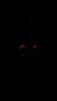 a yellow object is flying in the dark sky video