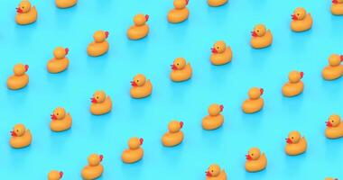 Big Yellow Rubber Ducks Move in Rows Seamlessly in a Diagonal Orthographic View Against Light Blue Background video