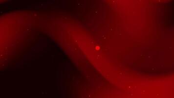 Abstract dark red background featuring smooth flowing gradients and scattered glowing particles video