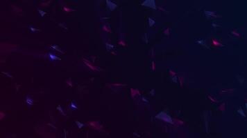 Dark stylish gaming styled background with shiny neon colored polygon shapes spinning past the camera with reflecting pink and blue light beams. Full HD and looping animation. video